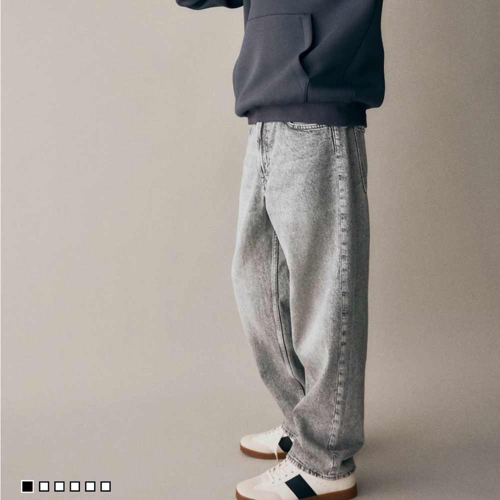 Loose-fit jeans with adjustable waistband, and straight legs.